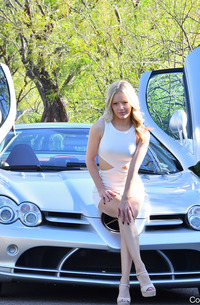 Hot Blond Riding Super Car