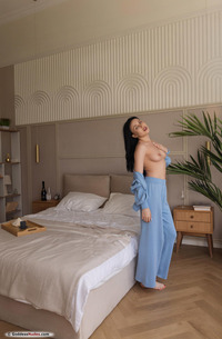 Kris Si Relaxing In Her Bedroom