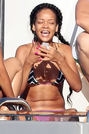 Rihanna flaunting her bikini body on a yacht