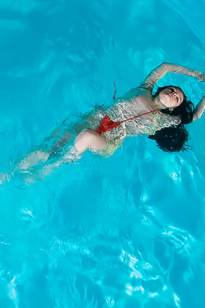 Ariana Mun Teases With Curly Hair And Hairy Pussy Play By The Pool